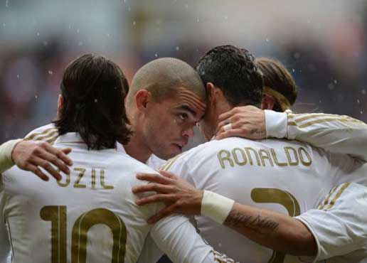 Real Madrid strolls to 3-0 win over Sevilla