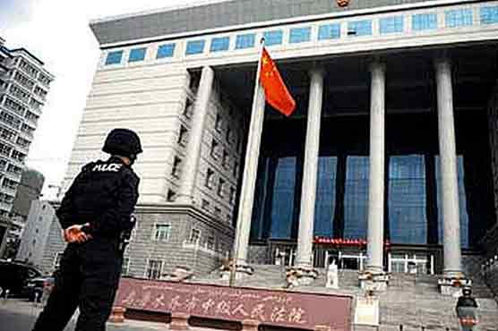 China's courts in Xinjiang jail 20 for terrorism