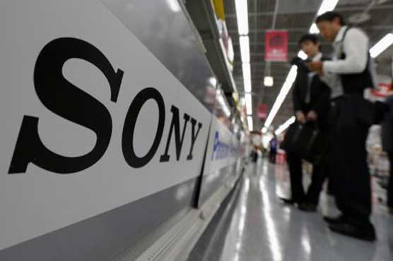 Sony's loss grows, cuts earnings forecast