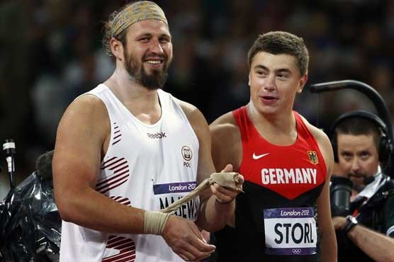 Majewski wins shot put gold, defends Olympic title