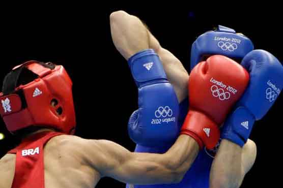 US men get late help at Olympic boxing