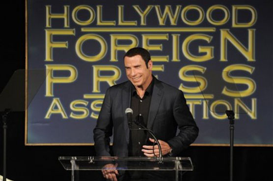 Travolta, Spielberg light up Foreign Press lunch
