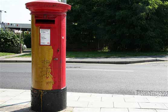 Over-excited Olympics fan caught painting post box gold