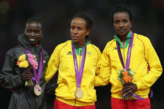 Defar upstages Dibaba to win Olympic 5,000 gold