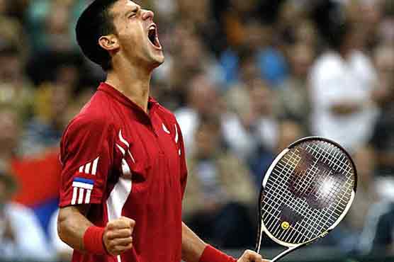 Djokovic does double duty to reach semis