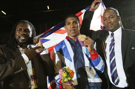 Britain's Joshua wins super heavyweight boxing gold