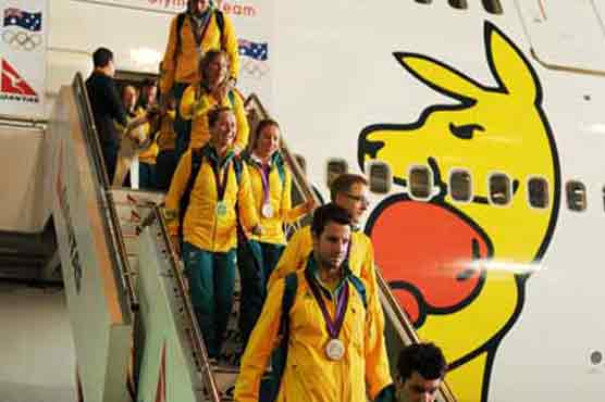 Olympics: Aussie athletes arrive home to praise 