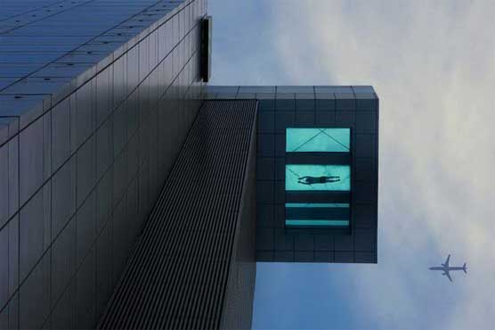 Swimming pool hangs 24 storeys in the sky 