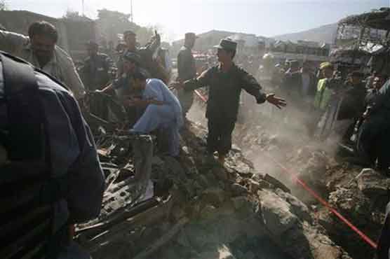 Bomb hidden in cemetery kills 2 in Afghanistan 