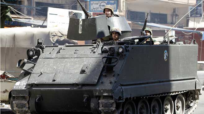 Syrian forces kill 23 in raids in Damascus