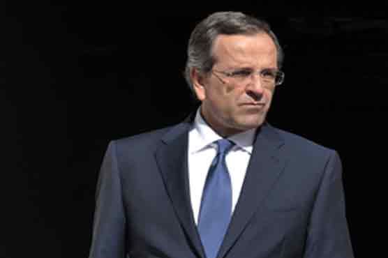 Greek PM takes debt crisis talks to Paris