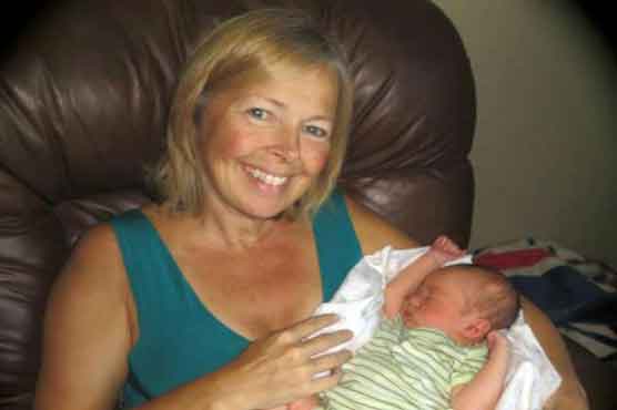  US woman gives birth to grandson