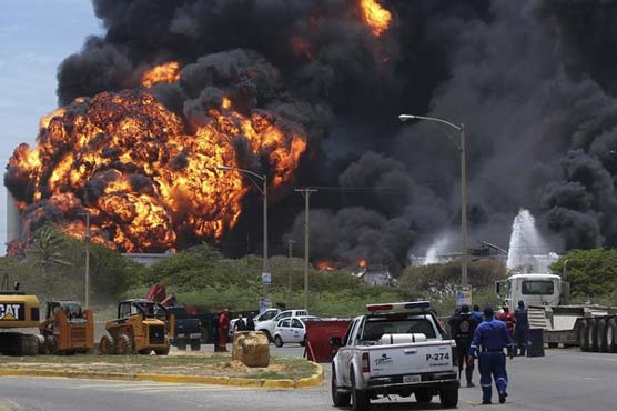 Venezuela refinery fire spreads, takes 41 lives