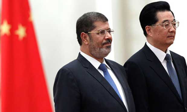China, wary of Arab Spring, hosts Egypt's Morsi