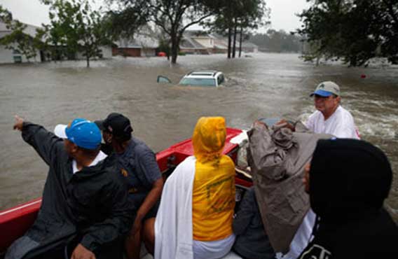 Families face grim wait in the dark as Isaac grinds on 