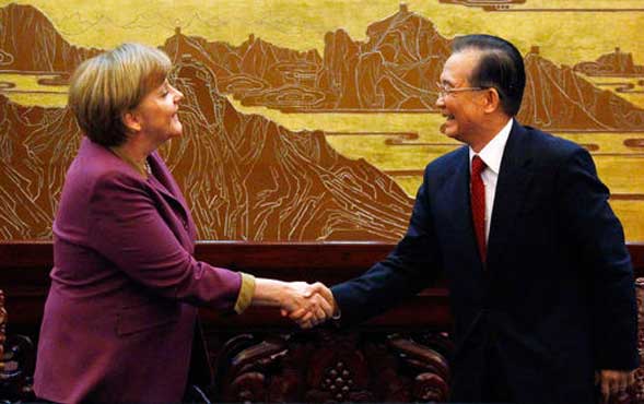 Angela Merkel in China for eurozone talks 