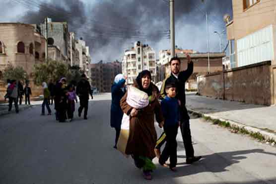 Syrian forces kill 8 children 9 women 