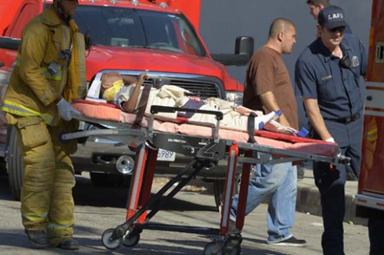 Police: 100-year-old driver hits 11 near US school