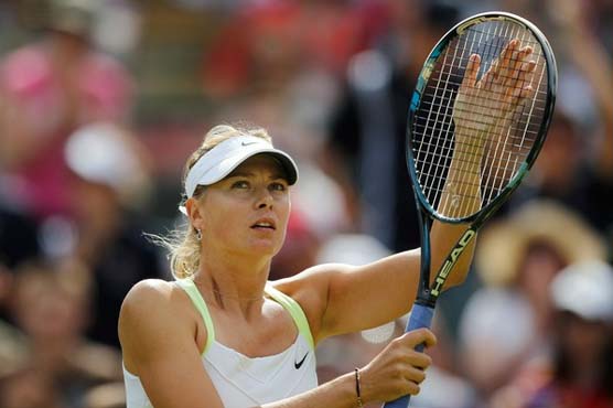 Sharapova entertains crowd in exhibition event