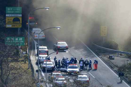 Cars trapped in tunnel collapse outside Tokyo