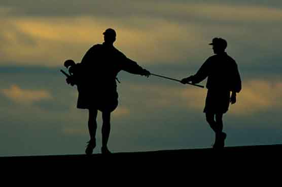 Golf: Caddies come to blows at Aussie Open