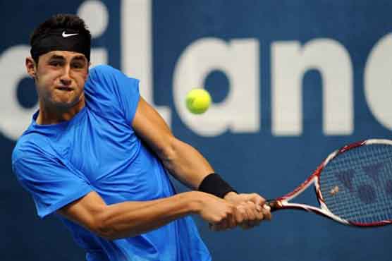 Tomic denies he was axed, vows to bounce back
