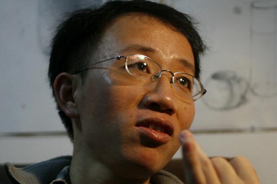 China dissident Hu Jia kept at home on rights day