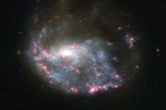 Hubble plumbs the universe, yields images of early galaxies