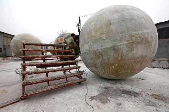 Great balls of China to defend against 'apocalypse'