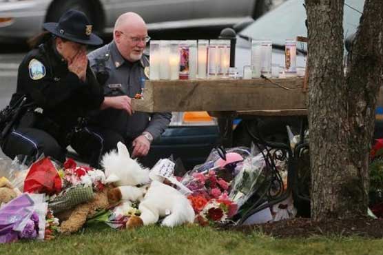 Newtown buries school massacre dead