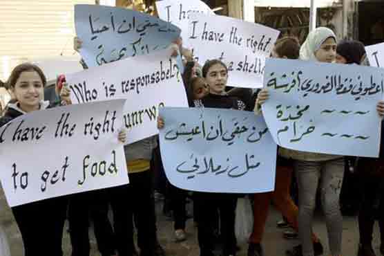 Palestinians flee after Yarmuk camp violence
