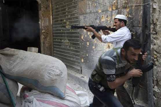 Talks underway as forces, rebels clash in Damascus suburbs 