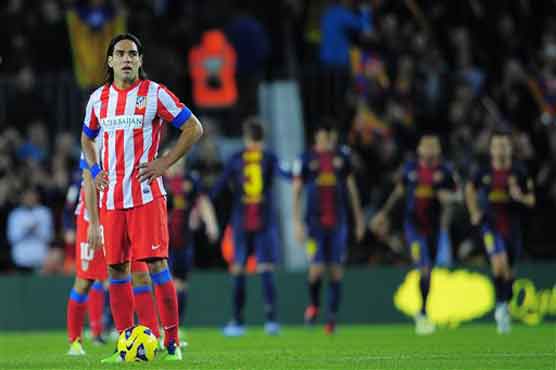 Atletico beats Celta to stay in touch with Barca