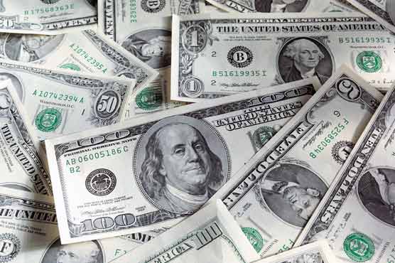 Dollar hits new 20-month high, tops 85 yen