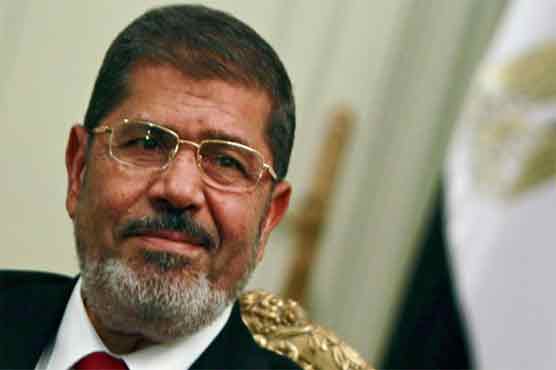 Mursi says new basic law is step towards stability