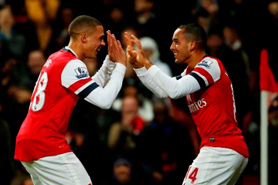 Theo Walcott stars as Arsenal routs Newcastle 7-3