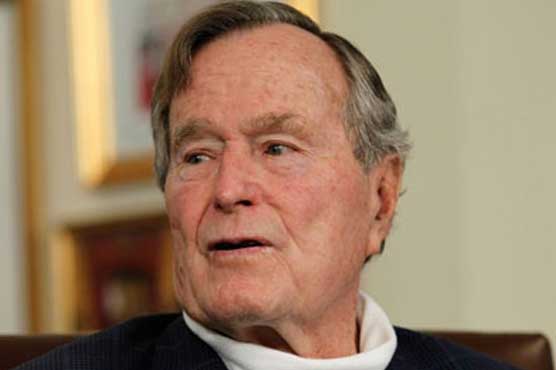Former President Bush moved out of intensive care