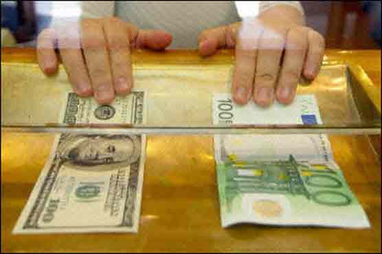 Dollar dips against yen, euro