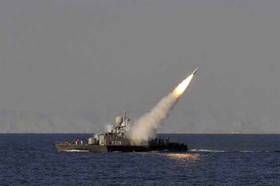 Iran test-fires missiles near Hormuz Strait