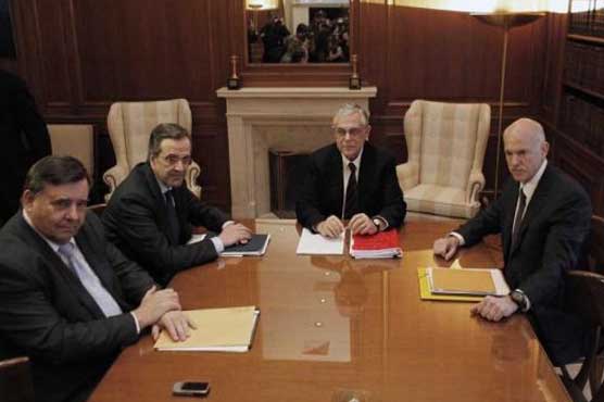 Greece caves in on civil service firings