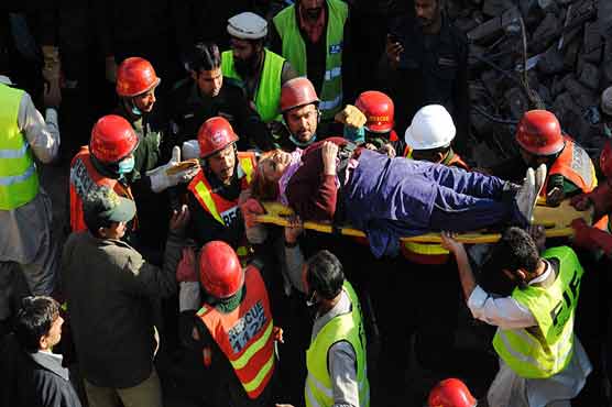 Woman, 60, pulled alive from rubble after 30 hours