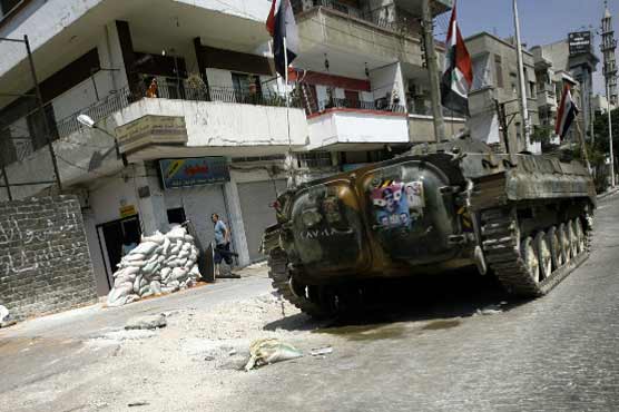 Activists accuse Assads forces of killing civilians in Homs