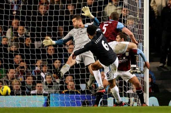 Lescott sends City back to the top