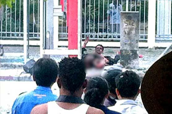 Bangkok panicked by string of blasts; suspect wounded 