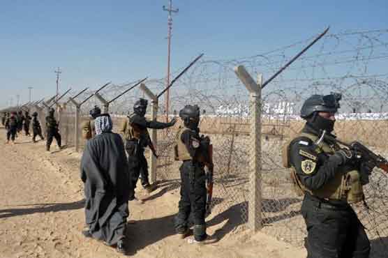 Iranian exile group moves to new Iraq camp