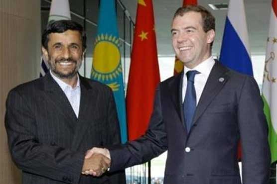 Iran, Russia leaders oppose foreign action in Syria