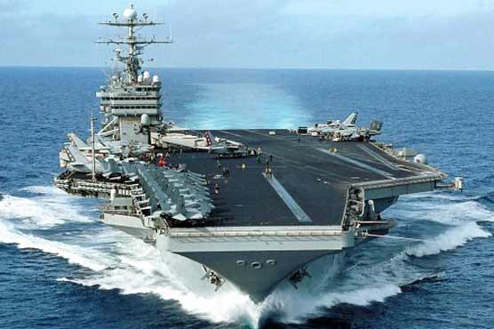 US vows to defy Iran warship warning