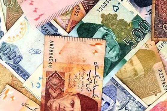 Rupee trades at record low against dollar