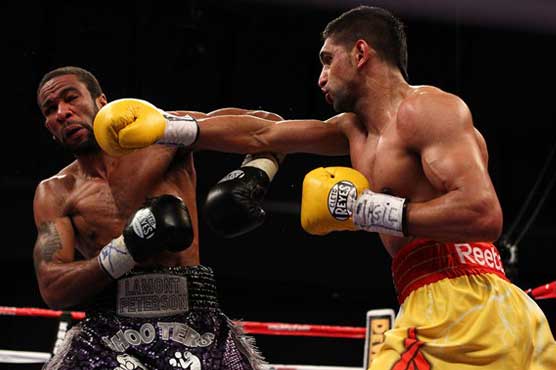 Boxing: Khan withdraws appeal of loss to Peterson