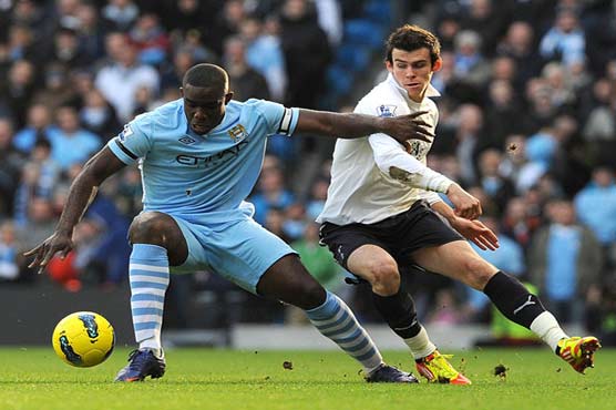 Man City beat Tottenham, Man United defeat Arsenal